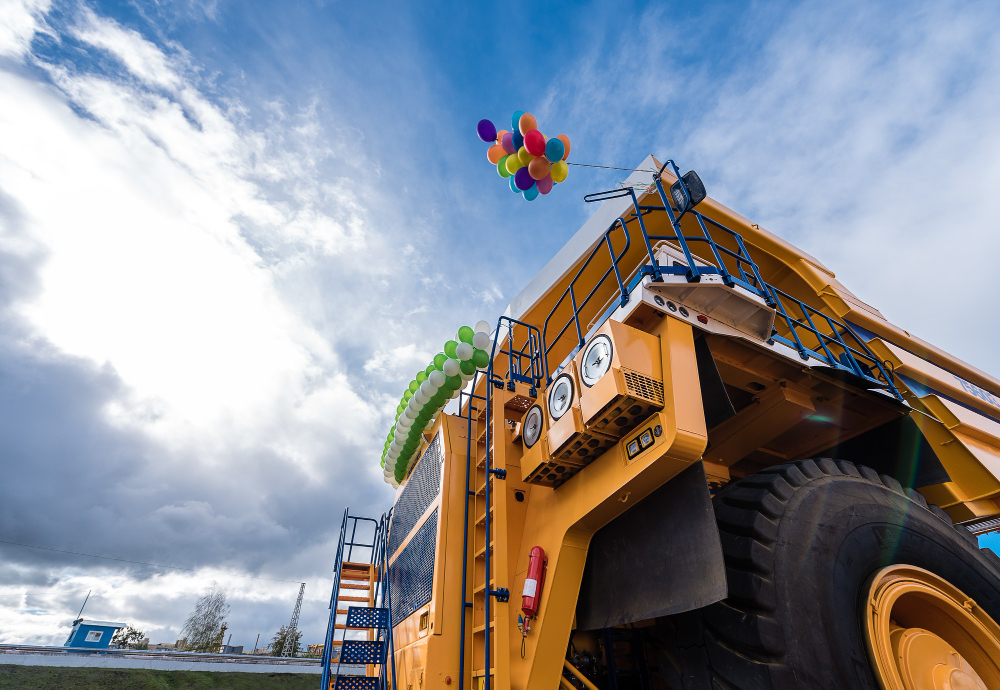 Excavator engine compartment showing engine mount access area